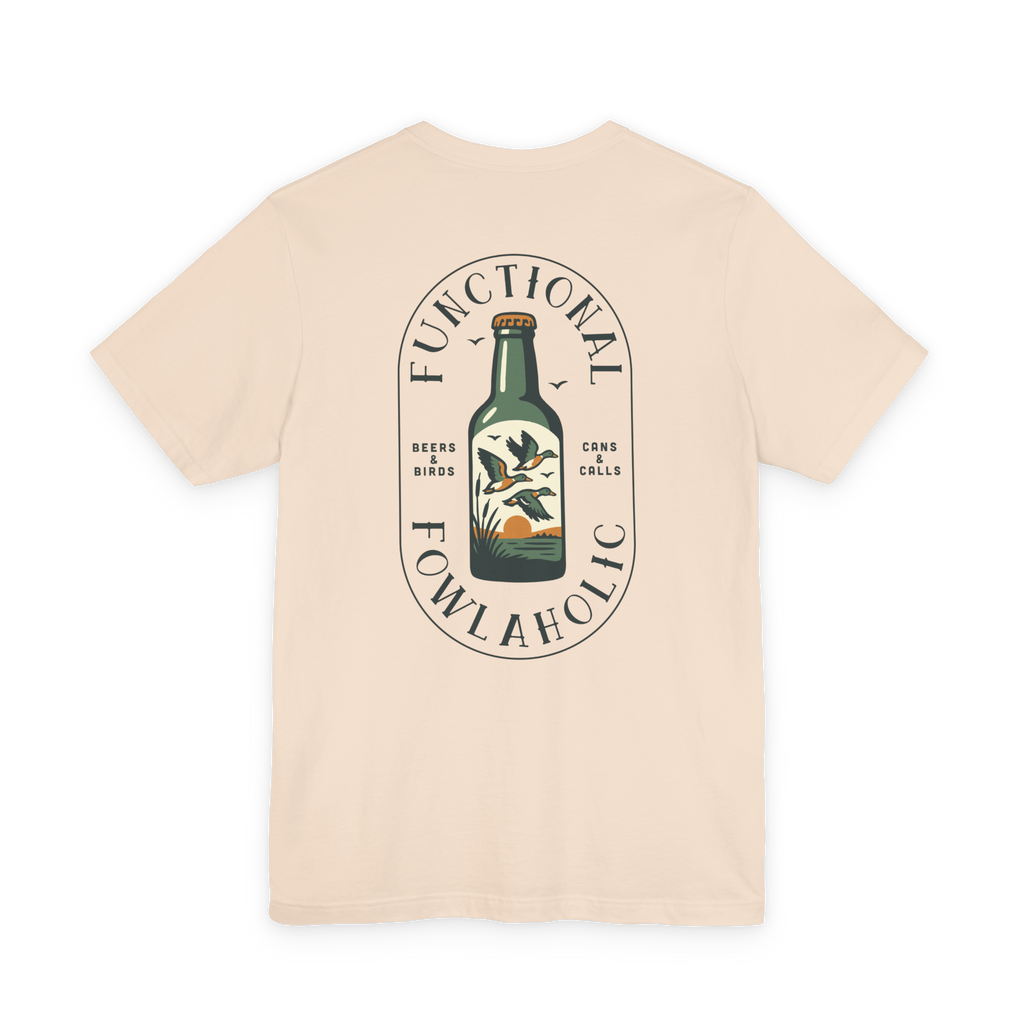 Beige t-shirt with a graphic design of a bottle and text on a white background